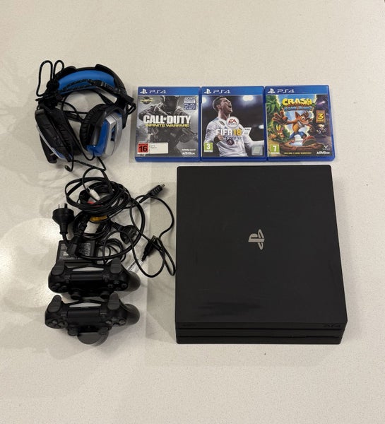 PS4 Pro 1TB, 2x controllers, 3x games + headset Carousel 1