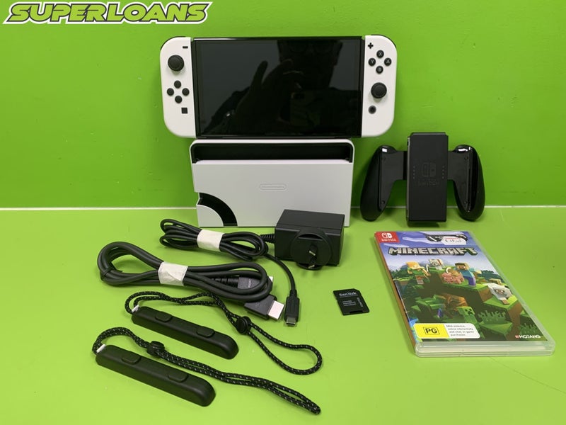 ** NINTENDO SWITCH CONSOLE + ACCESSORIES+ GAME + CHARGING DOCK + CORD + BOX** Carousel 1