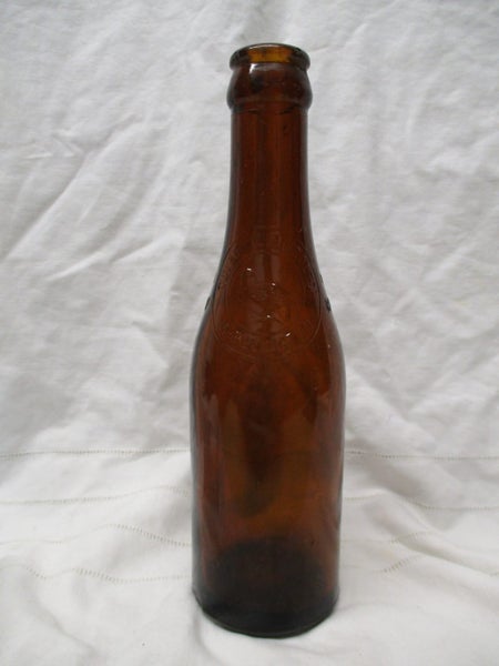 BR BA 9710 - Tui Bottling Col Ltd - Wellington - Amber Bottle Carousel 1