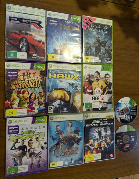 Xbox 360 with 2 remotes and 11 games Carousel 6