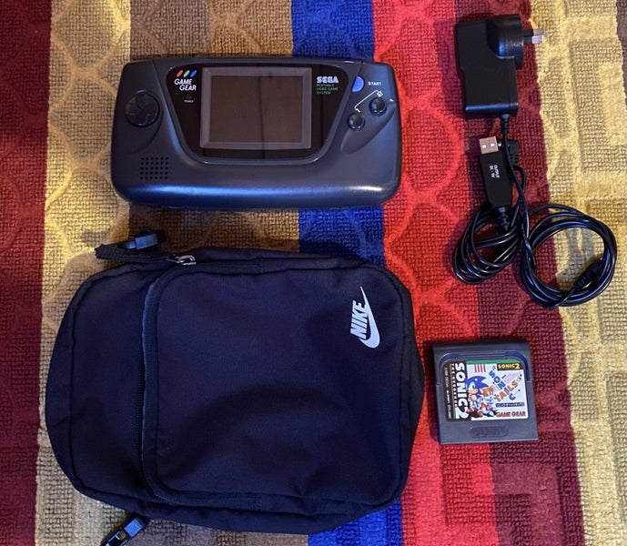 Sega Game Gear with usb and plug charger plus one game. Carousel 5