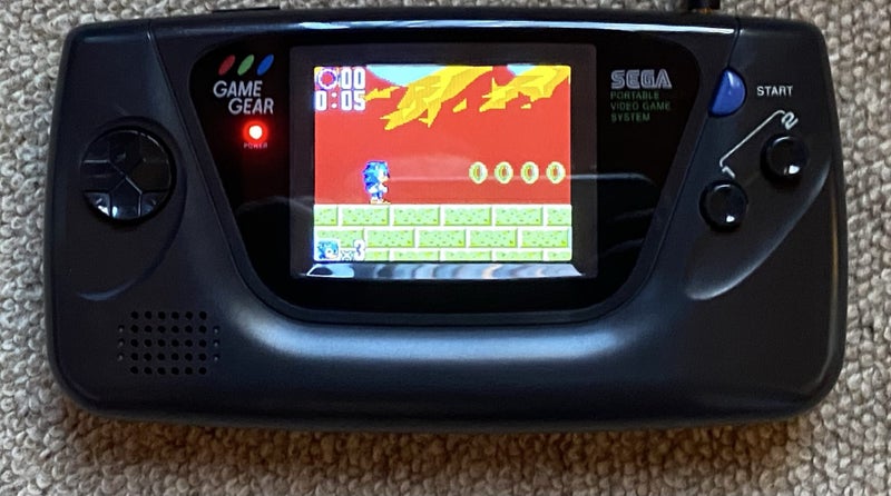 Sega Game Gear with usb and plug charger plus one game. Carousel 2