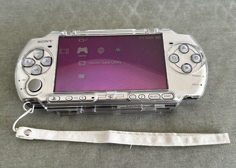 PlayStation Portable (PSP) 3000 – Mystic Silver | 64GB | Fully Set Up Carousel 4