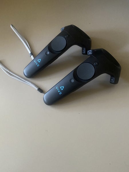 HTC vive controllers + charging cables Carousel 1