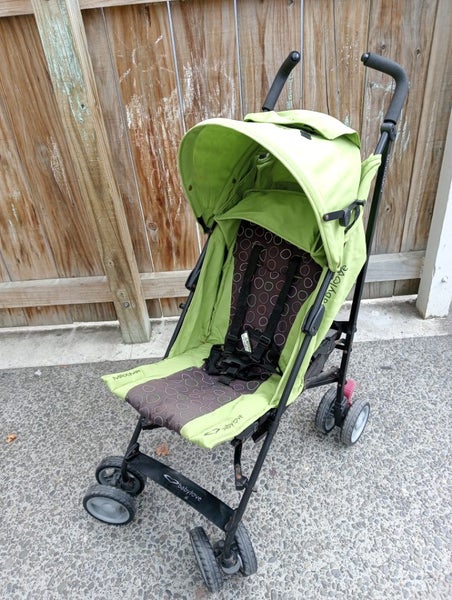 Stroller/ pram/ pushchair - green with basket and hood Carousel 1