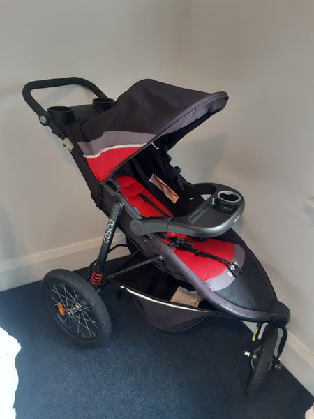 COSCO All terrain pram + baby capsule + base Carousel 2