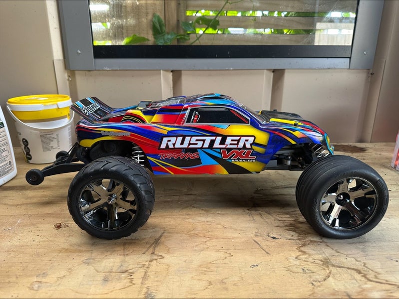 Traxxas Rustler VXL and 4TEC 2 with Velineon Upgrade Carousel 1