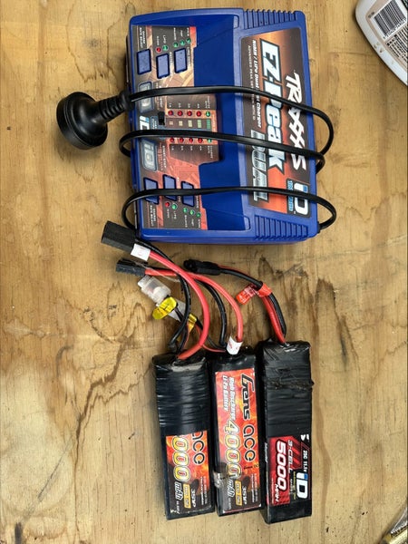 Traxxas Rustler VXL and 4TEC 2 with Velineon Upgrade Carousel 14