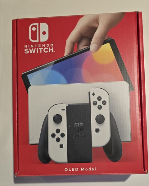 White Nintendo Switch OLED with screen protector, case, and handheld controller Carousel 2
