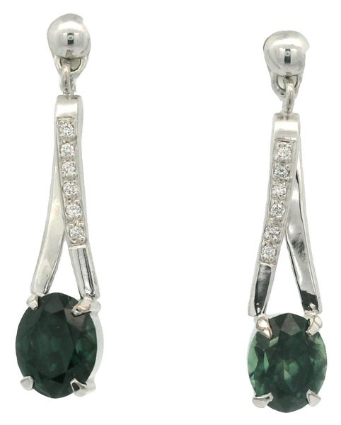 Handmade 9ct white gold sapphire and diamond earrings. Carousel 1