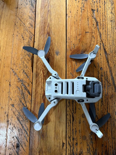 DJI Mini 4K Drone + Spare Battery Carousel 2