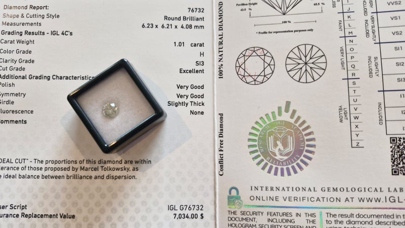 $1 RES * Valuation $11,883.00 * 1.01ct Round Large White Diamond Loose IGL CERT Carousel 1