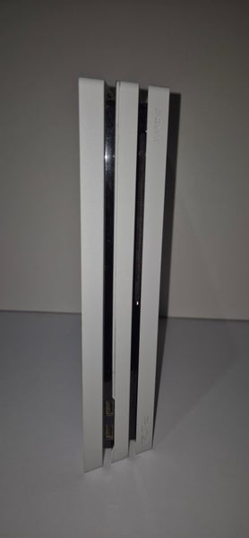 Ps4 Pro(White) + 2 remotes + 2 games Carousel 6