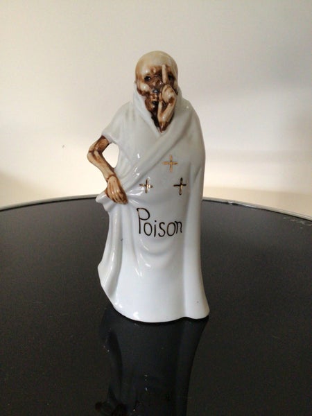 Grim Reaper Poison Bottle Carousel 1