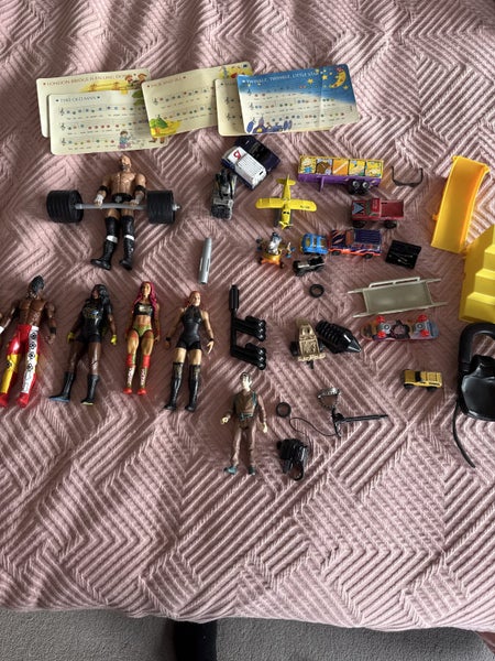 wwwe figures + mixture of toys Carousel 4