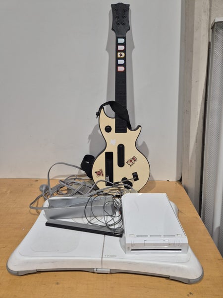 Nintendo Wii console with Power Supply, Balance Board, Guitar, Bar and Cables Carousel 1