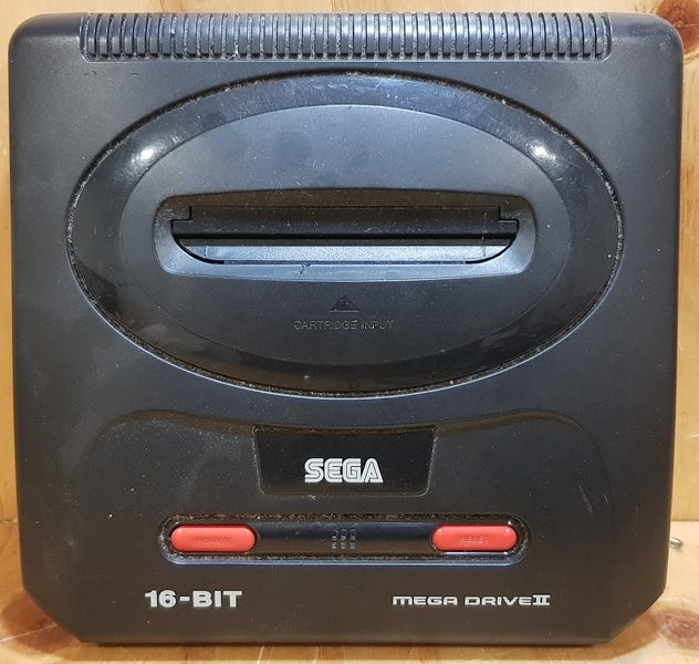 VINTAGE - SEGA MEGA DRIVE II WITH POWER SUPPLY AND 2x CONTROLLERS Carousel 1