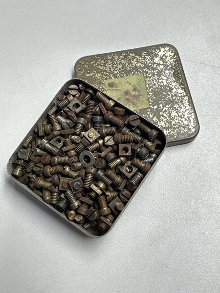Meccano Nuts & Bolts in Small Parts Tin Carousel 1
