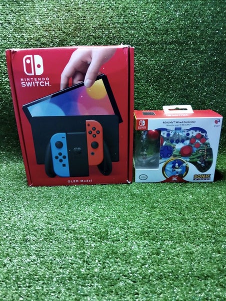 Nintendo switch OLED model, with box , accessories & Sonic hedgehog pro control Carousel 2