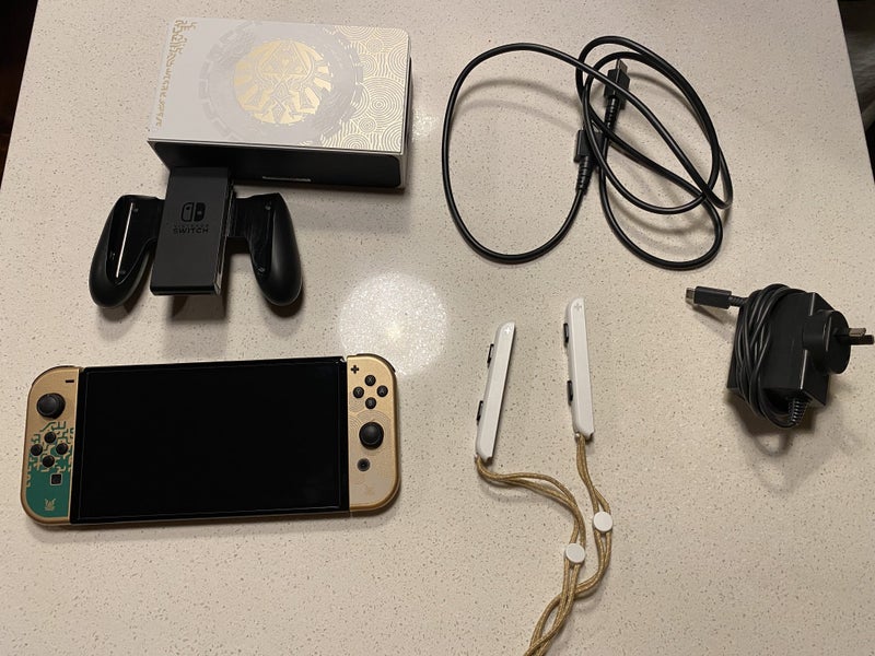 Nintendo Switch OLED Legend of Zelda Limited Edition + 2 games and carry case Carousel 2