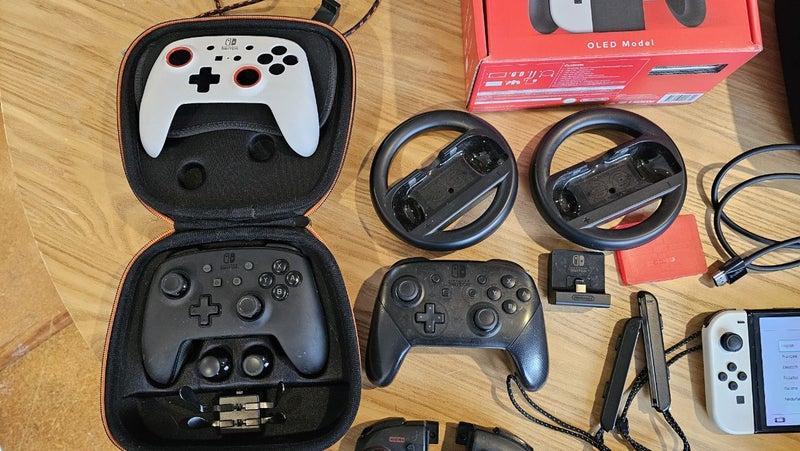 Nintendo Switch OLED 312gb mega bundle Carousel 2