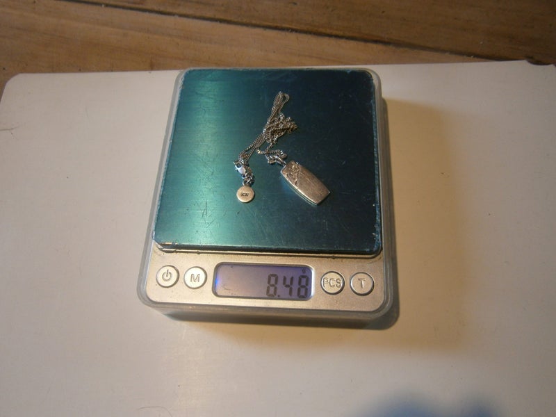 STG.SILV. K.WALKER STAR INGOT PENDANT ON KW CHAIN Carousel 7