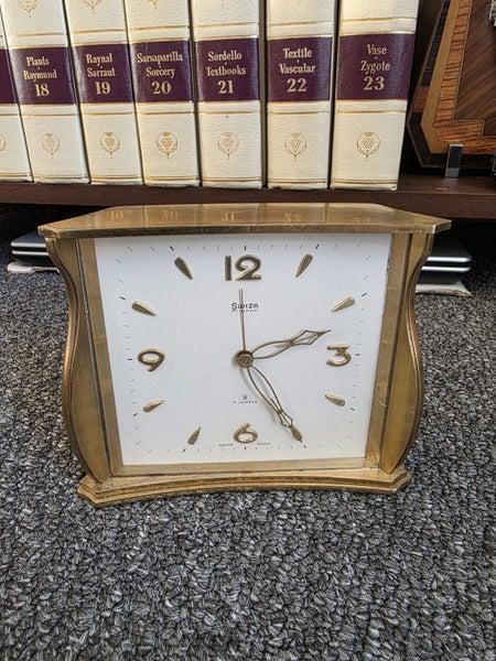 Heavy solid brass Swiza clock 8 day 7 jewels Carousel 1