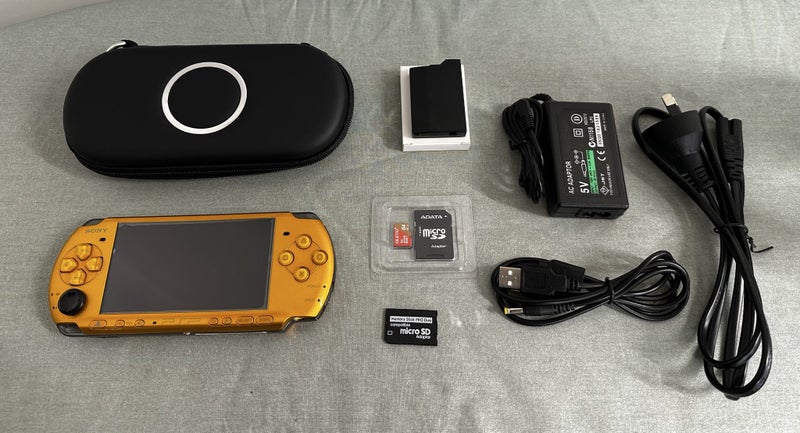 PlayStation Portable (PSP) 3000 – Carnival Yellow | 64GB | Fully Set Up Carousel 1