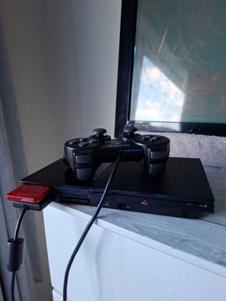 Ps2 Slim + Games Carousel 1