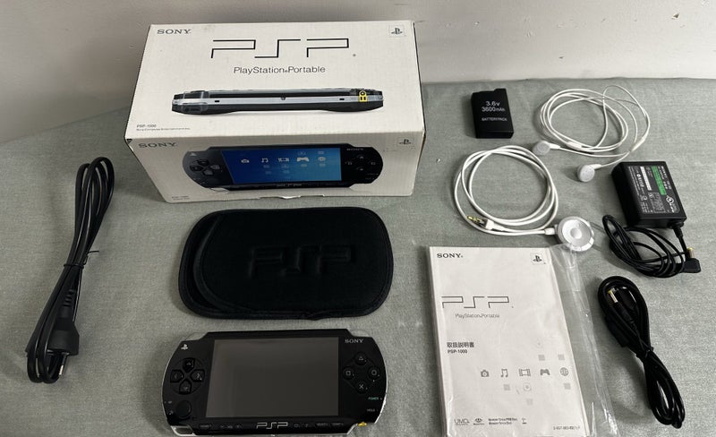 PlayStation Portable 1000 – Piano Black | Great Condition | Boxed Carousel 1