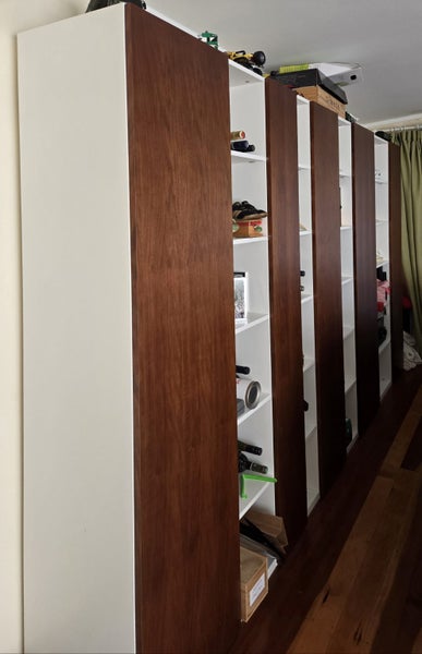 Wall unit with alternating doors. White and light tan full length timber doors63616345868801113