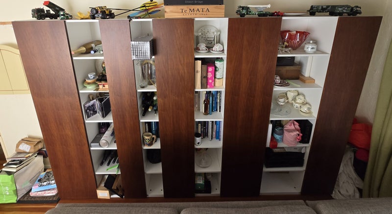 Wall unit with alternating doors. White and light tan full length timber doors63616345868801114