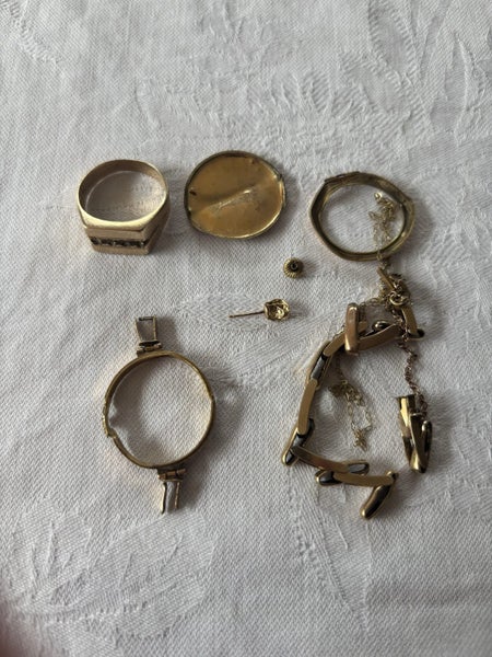 14.6g of scrap 9ct gold, 1 DOLLAR RESERVE Carousel 1