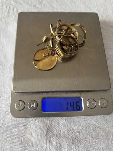 14.6g of scrap 9ct gold, 1 DOLLAR RESERVE Carousel 2