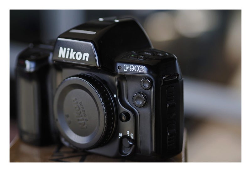Nikon F90X Film camera...mint Carousel 1