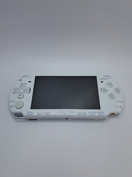 * White PSP 2000 Console (Faulty) * Carousel 1