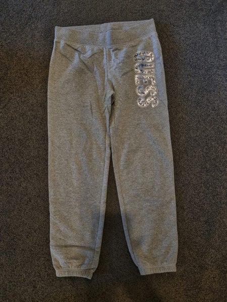 GUESS track pants. Carousel 1