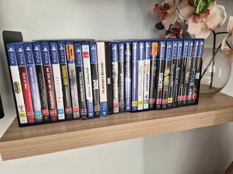 PS4 Pro with 2 controllers and bulk games!! Carousel 2