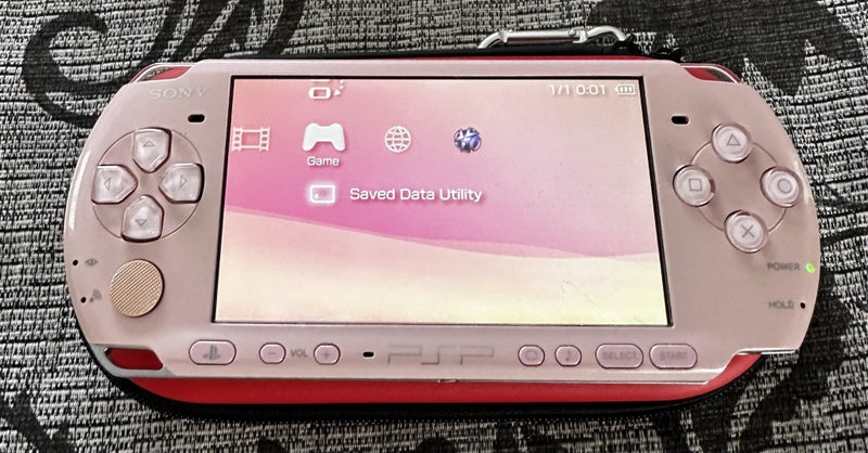 PlayStation Portable – Blossom Pink | 64GB | Fully Set Up63617599387650111