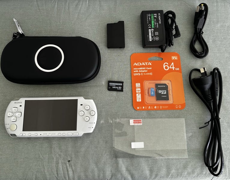 PlayStation Portable (PSP) 3000 – Pearl White | 64GB | Fully Set Up Carousel 1