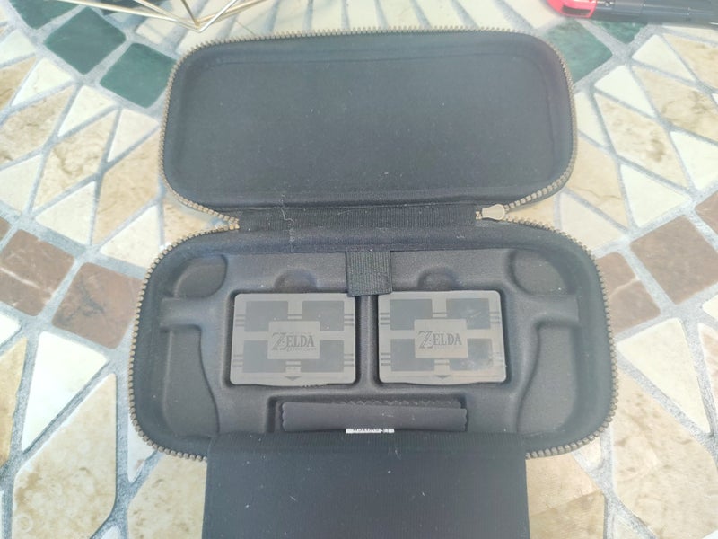 Nintendo Switch + Case and 128GB memory card Carousel 9