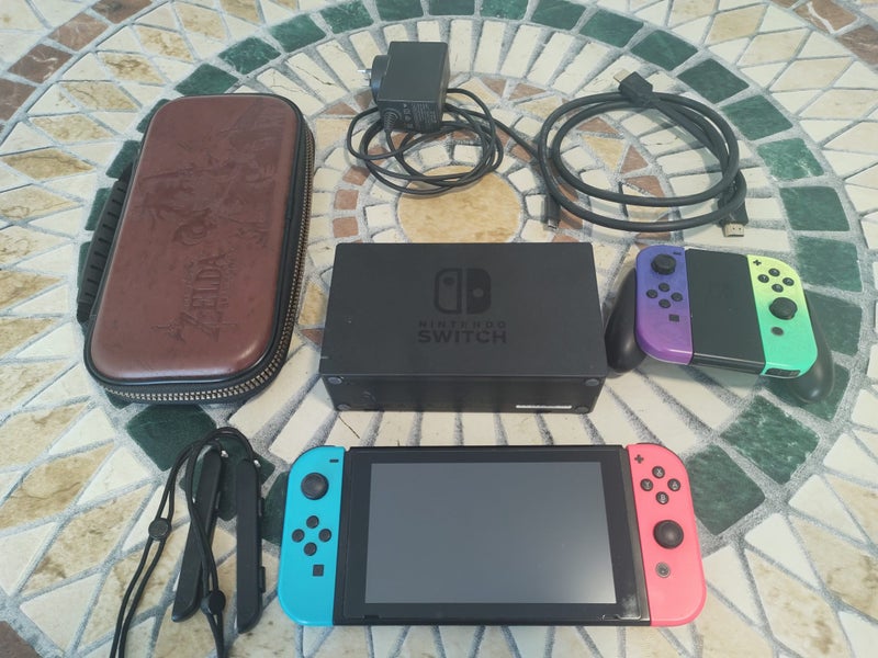 Nintendo Switch + Case and 128GB memory card Carousel 1