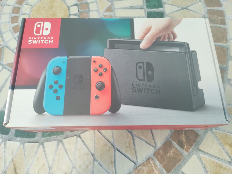 Nintendo Switch + Case and 128GB memory card Carousel 2