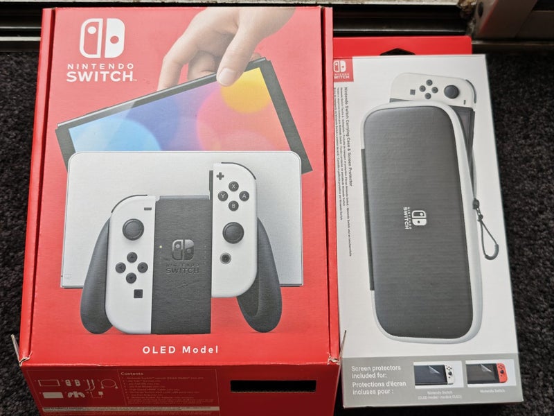 Nintendo Switch OLED White with carry case & box Carousel 1