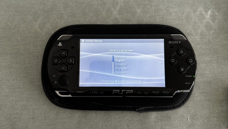 PlayStation Portable (PSP) 2000 – Piano Black | 64GB | Fully Set Up63617292648707111
