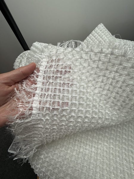 Exclusive white hand-woven couture fabric from Paris. Carousel 2