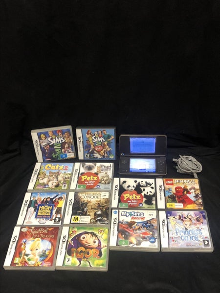 NINTENDO DSI XL + 12 GAMES *$1 reserve * Carousel 2