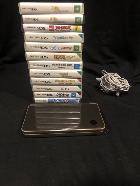 NINTENDO DSI XL + 12 GAMES *$1 reserve * Carousel 1