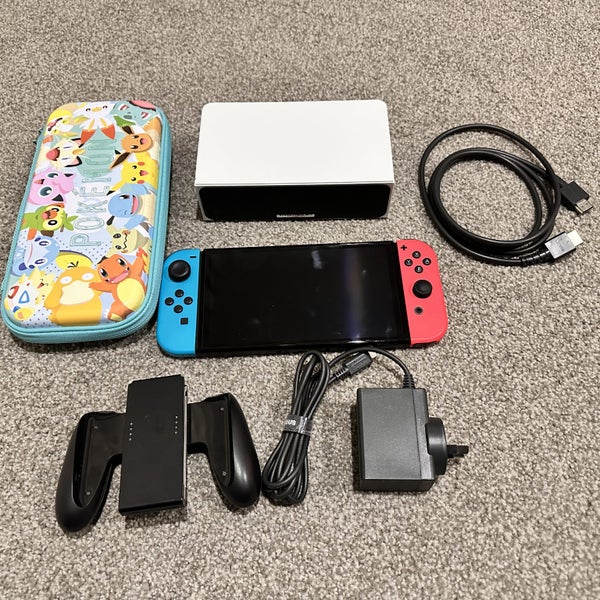 Nintendo Switch OLED Console with a Free Game and Protection Case Carousel 4