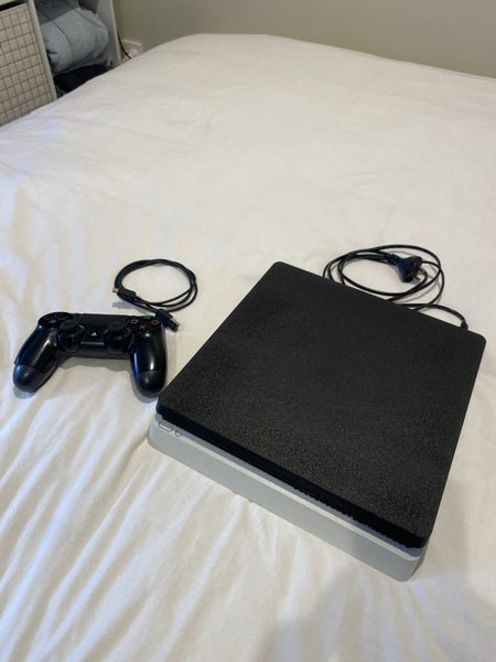 PS4 Console. Controller. Power Cord and Charge Cable Carousel 4